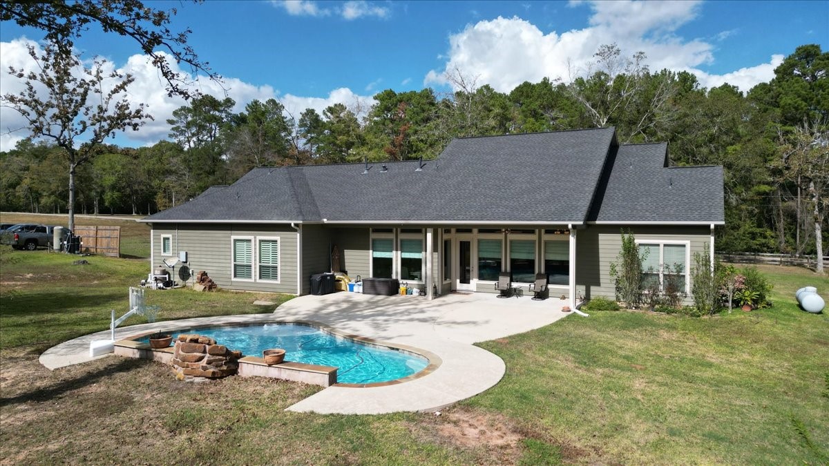 27785 Log Cabin Road Montgomery, TX 77356 - Photo 43 of 50 front view of a house with a patio