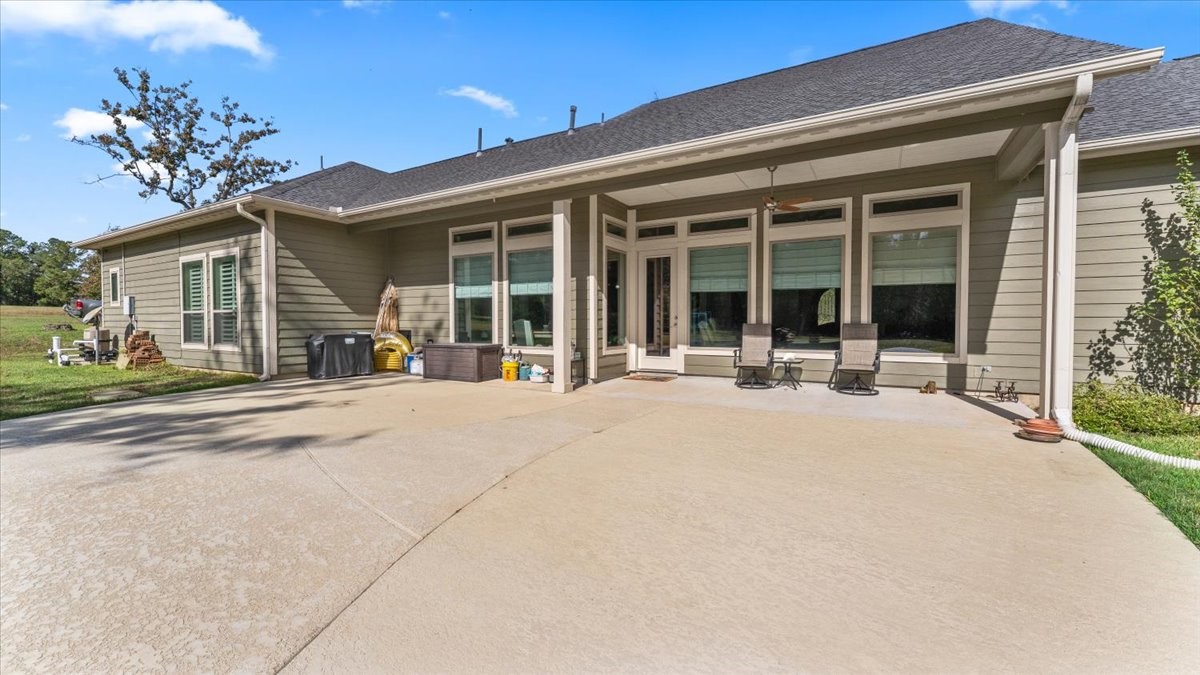 27785 Log Cabin Road Montgomery, TX 77356 - Photo 48 of 50 front view of a building with potted plants and a potted plant