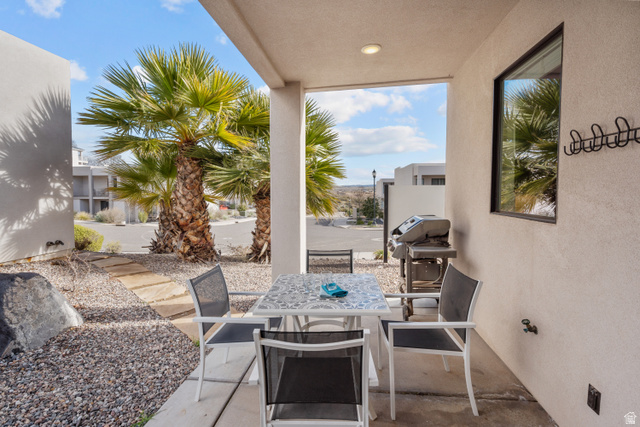 1122 South 1790th West, Unit 1 St. George, UT 84770 - Photo 2 of 37 Covered patio featuring recessed lighting, a stucco exterior, and a permanent wall-mounted coat rack
