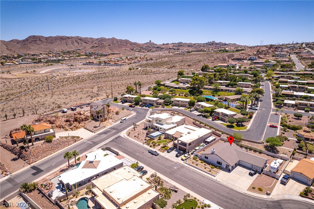 524 Swallow Cove Boulder City, NV 89005 - Photo 51 of 58 Vast desert landscapes surround this tranquil residential area, offering serene mountain views and peaceful living.
