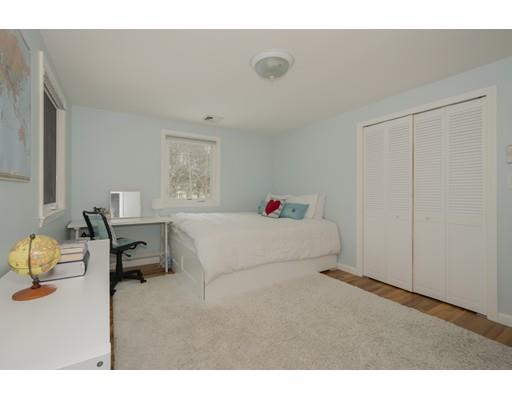 8 Saddle Club Road Lexington, MA 02420 - Photo 18 of 30 a living room with furniture and a window