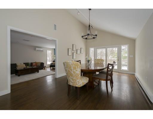8 Saddle Club Road Lexington, MA 02420 - Photo 9 of 30 a view of a dining room with furniture and wooden floor