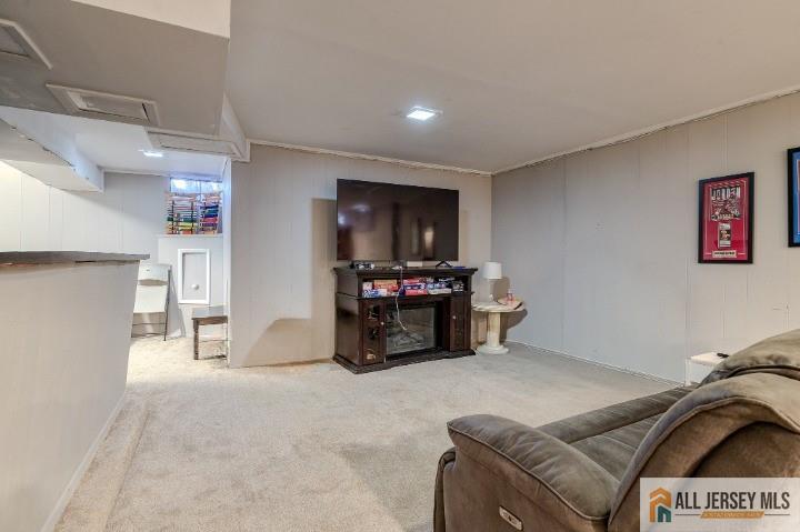 16 Pendleton Place Old Bridge, NJ 08857 - Photo 23 of 30 a bed room with a bed and a television