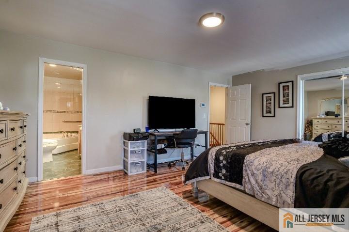 16 Pendleton Place Old Bridge, NJ 08857 - Photo 10 of 30 a bedroom with a bed and a television