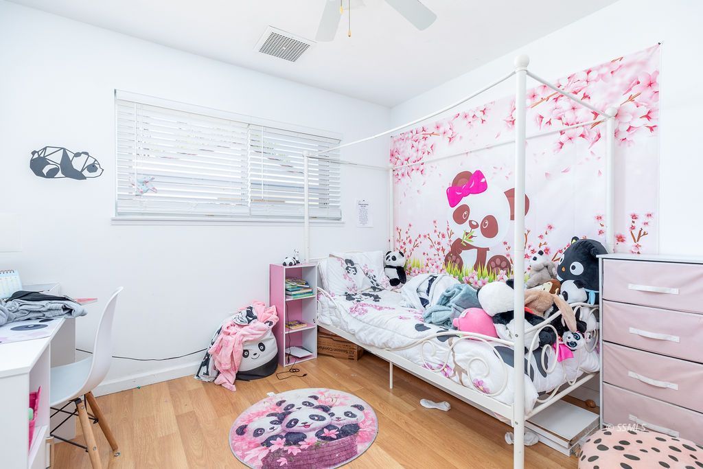 328 Peg Street Ridgecrest, CA 93555 - Photo 13 of 20 a bedroom with a bed and a window