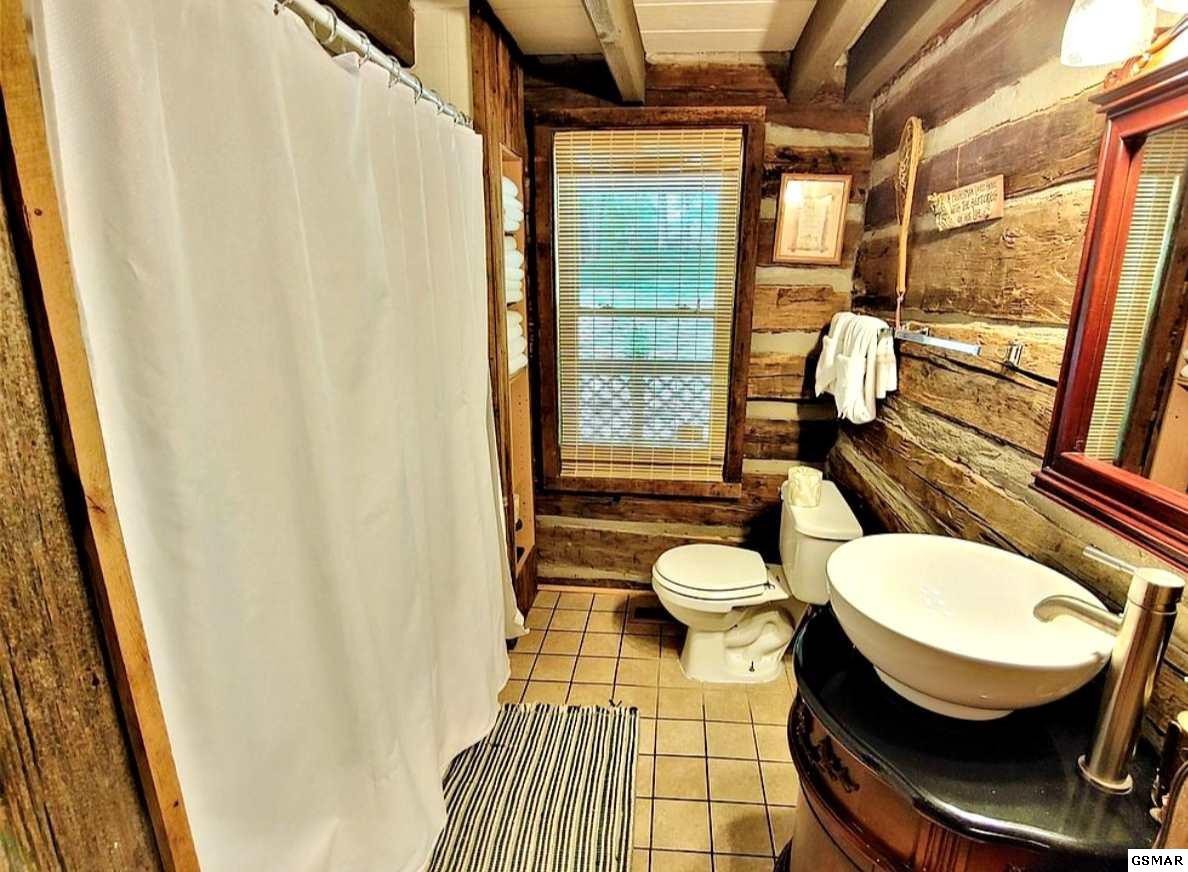 2124 Key Way Sevierville, TN 37876 - Photo 8 of 29 a bathroom with a toilet sink and mirror
