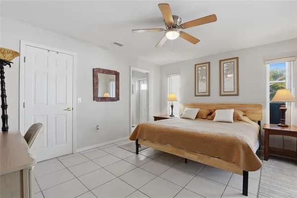 a bedroom with a bed furniture and a window