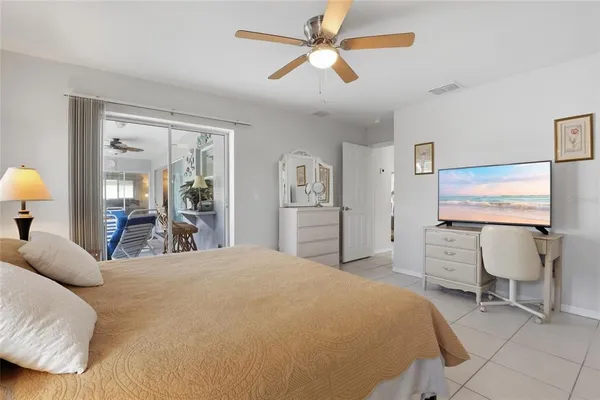 a bedroom with a bed and furniture