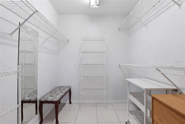 a view of an empty walk in closet