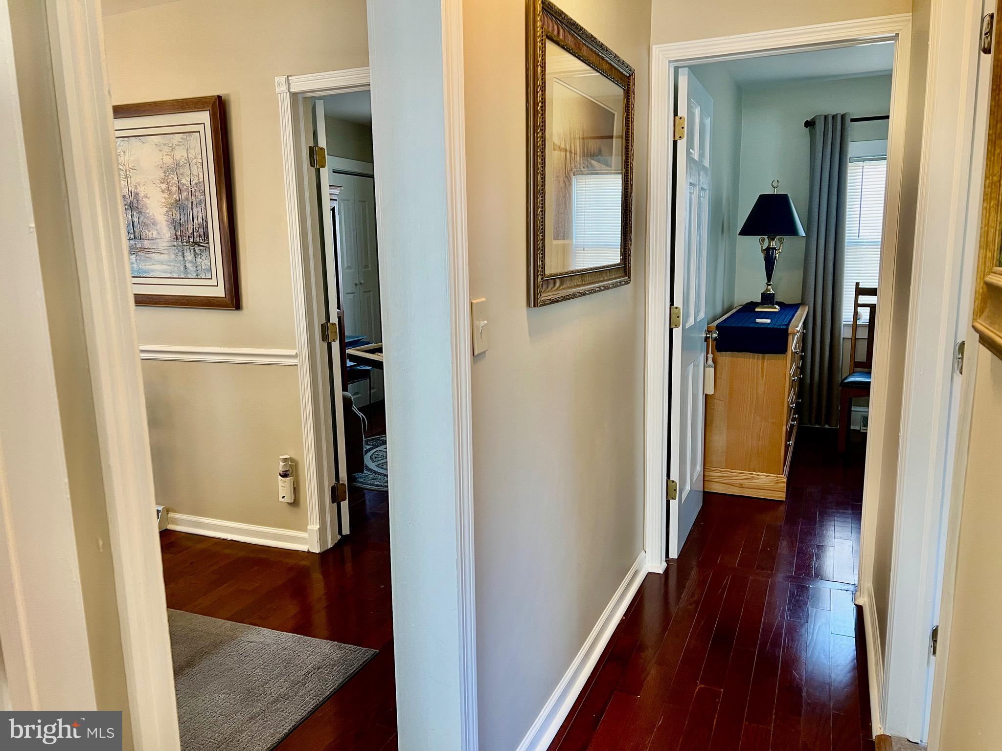 87 Saybrook Avenue Hamilton, NJ 08619 - Photo 14 of 41 a view of a hallway with wooden floor and closet