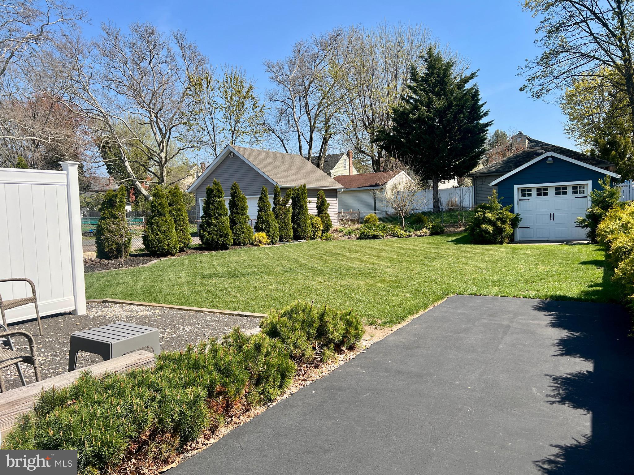 87 Saybrook Avenue Hamilton, NJ 08619 - Photo 31 of 41 a front view of a house with yard and green space