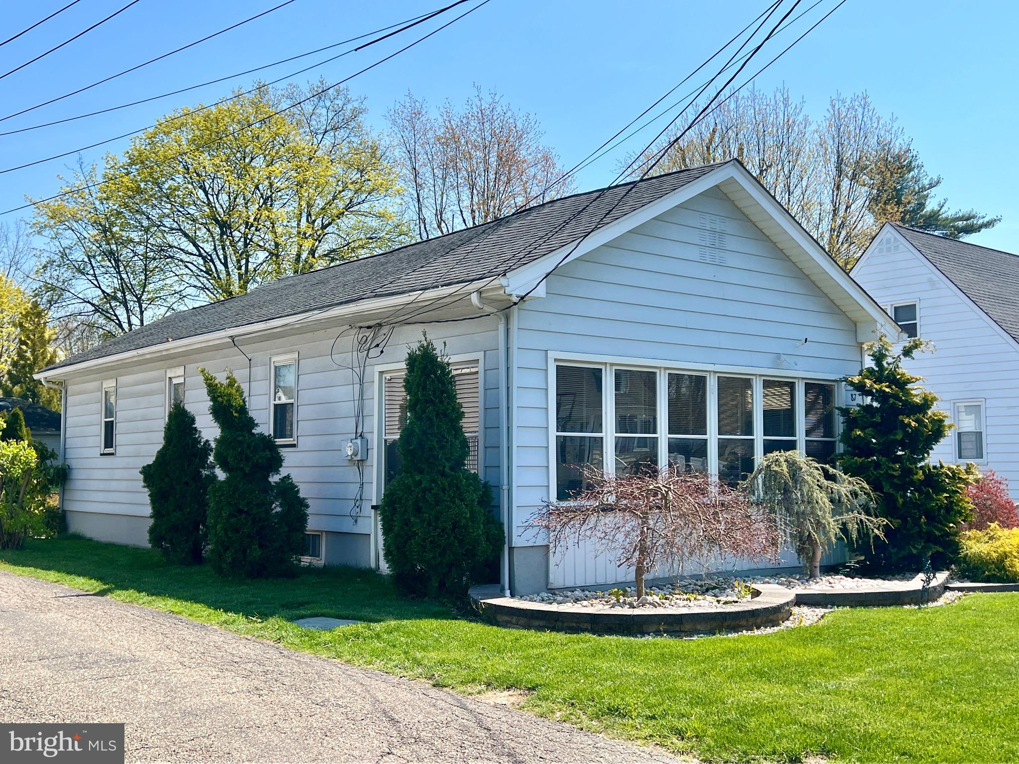 87 Saybrook Avenue Hamilton, NJ 08619 - Photo 40 of 41 a front view of house with a garden
