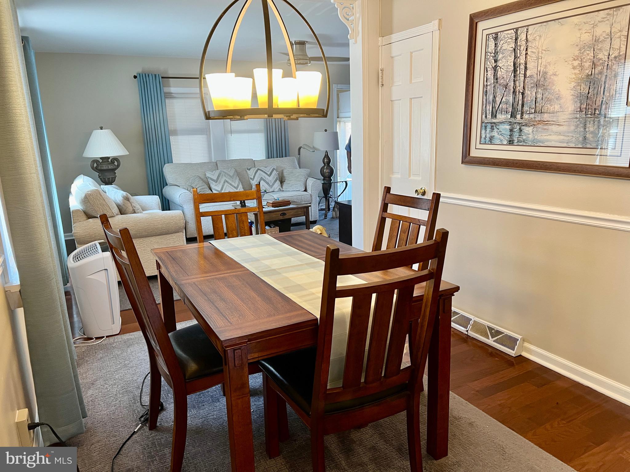 87 Saybrook Avenue Hamilton, NJ 08619 - Photo 9 of 41 a view of a dining room with furniture and a chandelier
