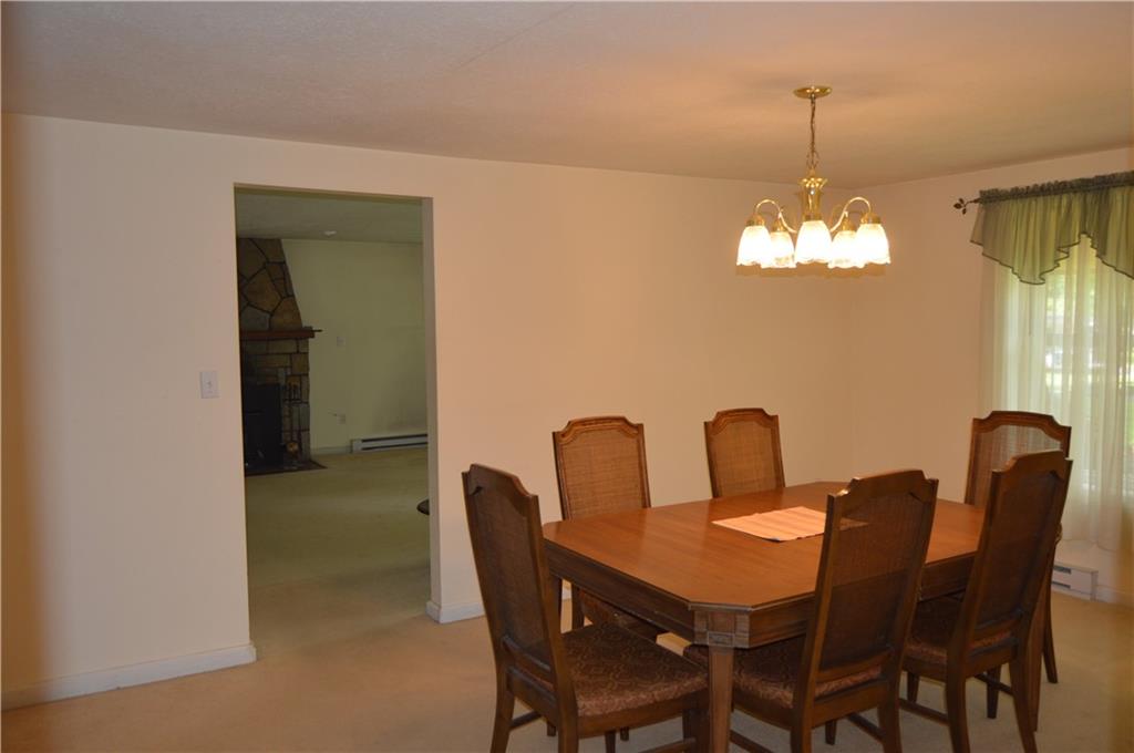 3244 Maple Lane Jamestown, PA 16134 - Photo 11 of 27 a dining room with furniture and chandelier kitchen