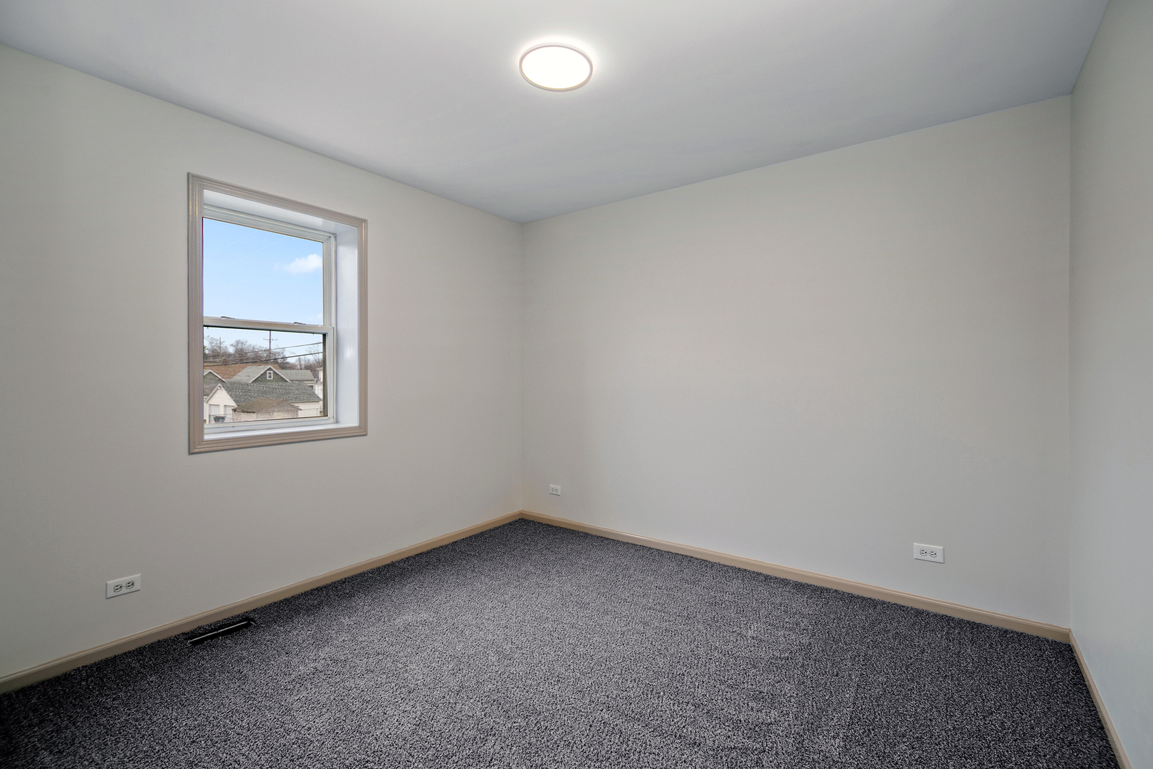 1320 South 3rd Avenue Kankakee, IL 60901 - Photo 14 of 19 an empty room with a window