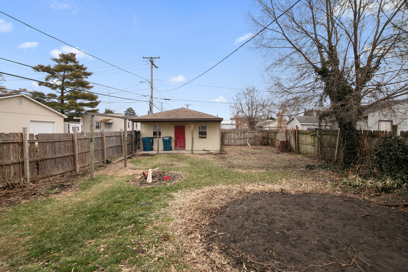 1320 South 3rd Avenue Kankakee, IL 60901 - Photo 17 of 19 a view of a house with a yard