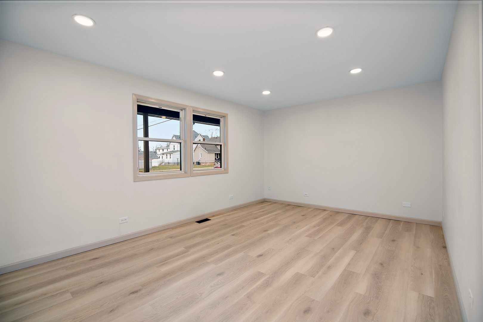 1320 South 3rd Avenue Kankakee, IL 60901 - Photo 4 of 19 an empty room with windows