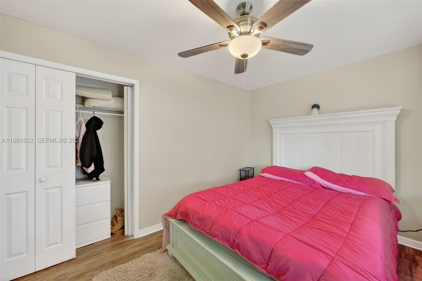 9401 Southwest 97th Avenue Miami, FL 33176 - Photo 34 of 77 a bedroom with a bed and a mirror