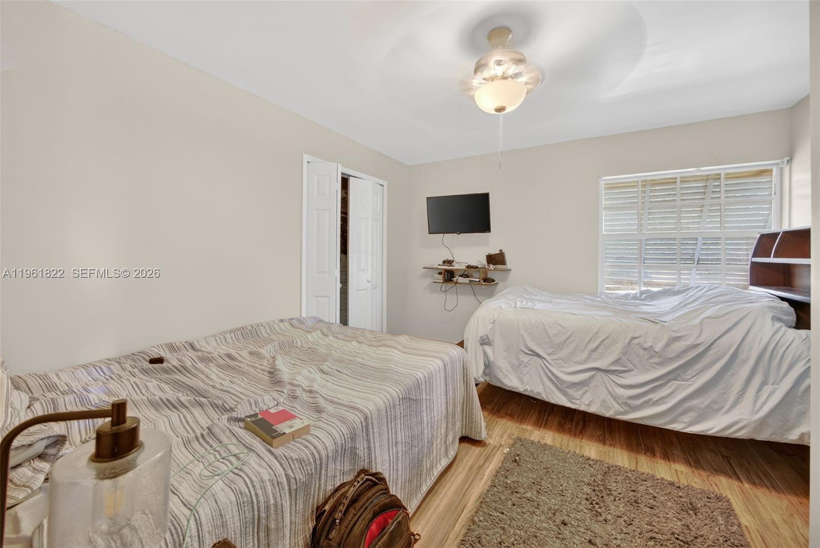 9401 Southwest 97th Avenue Miami, FL 33176 - Photo 35 of 77 a bedroom with a bed and a tv