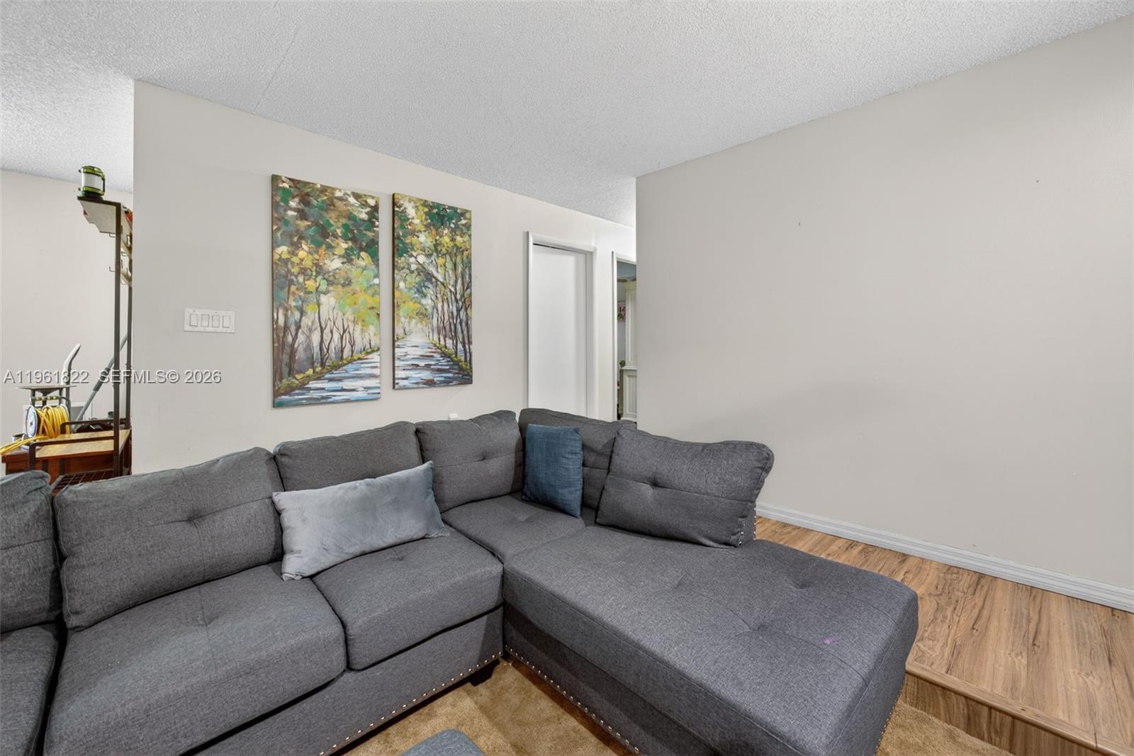 9401 Southwest 97th Avenue Miami, FL 33176 - Photo 38 of 77 a living room with furniture and a window