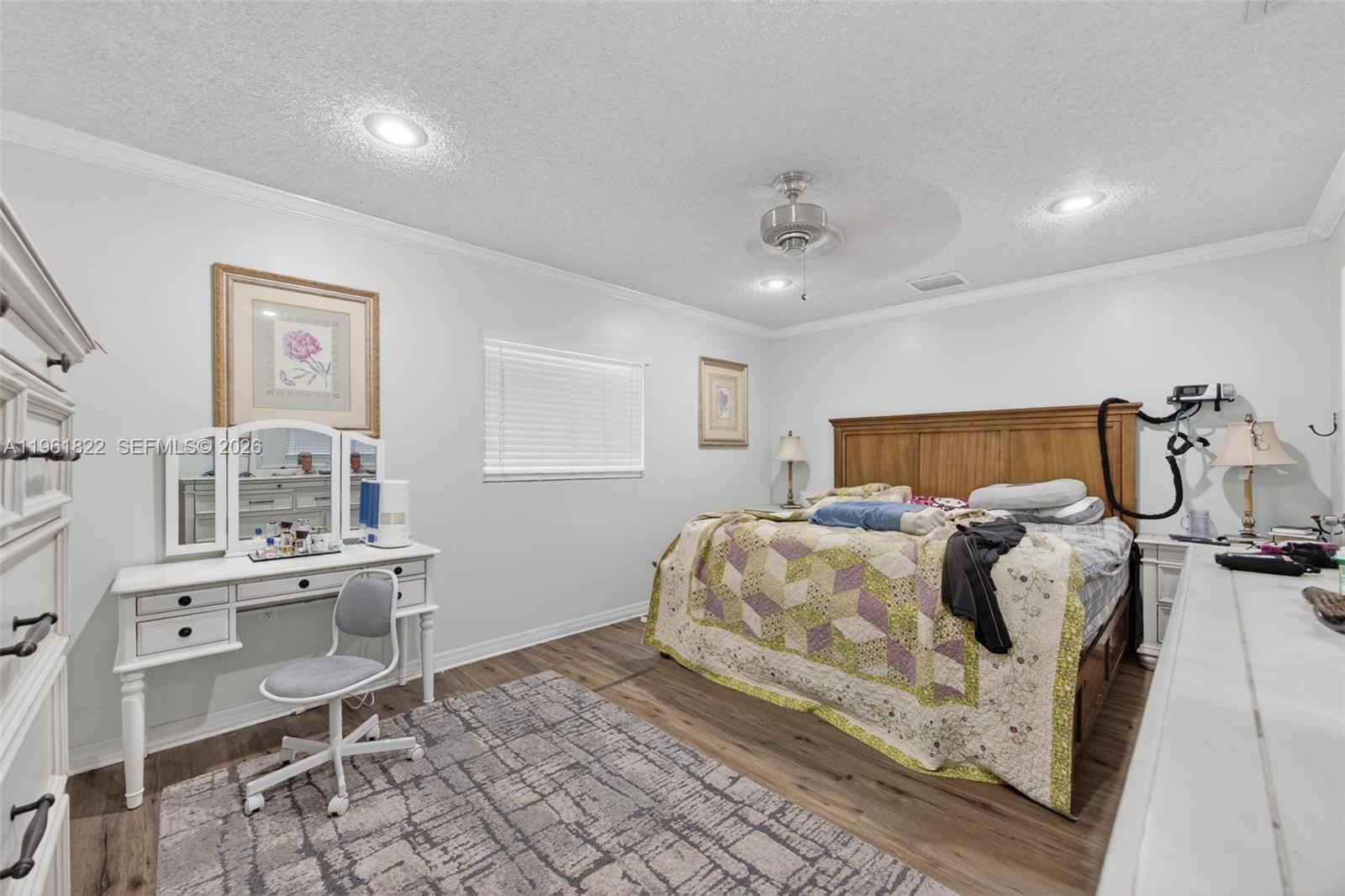 9401 Southwest 97th Avenue Miami, FL 33176 - Photo 49 of 77 a bedroom with a bed and a desk