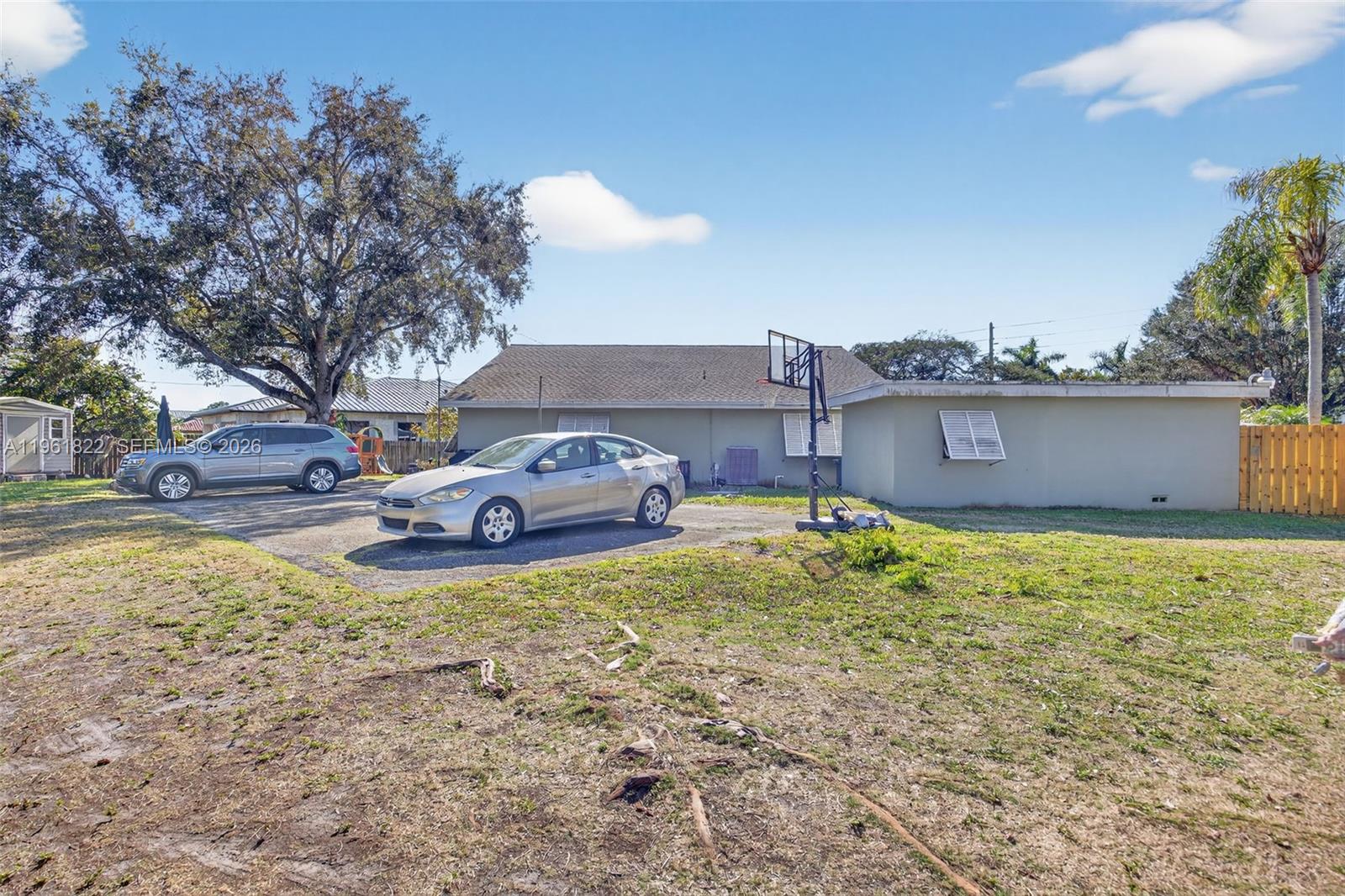 9401 Southwest 97th Avenue Miami, FL 33176 - Photo 66 of 77 a view of a house with a yard
