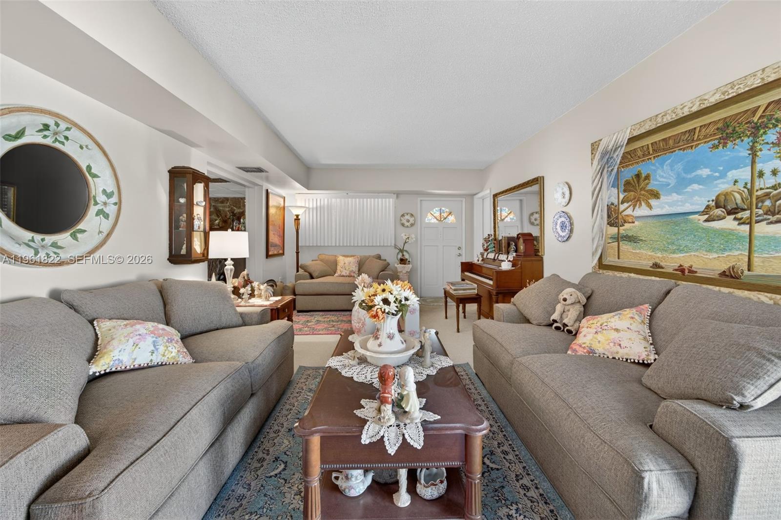 9401 Southwest 97th Avenue Miami, FL 33176 - Photo 9 of 77 a living room with furniture and a large window