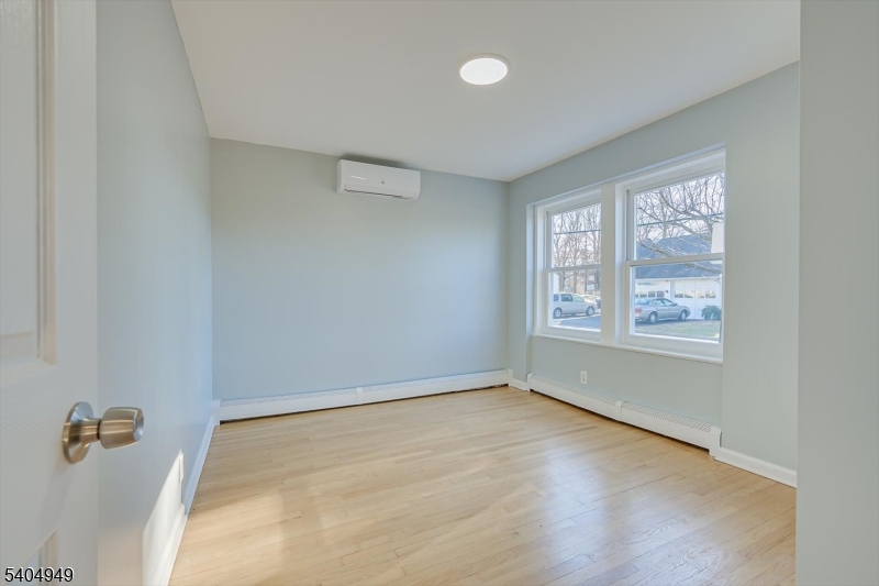 34 Tillman Street Raritan, NJ 08869 - Photo 16 of 31 an empty room with a window