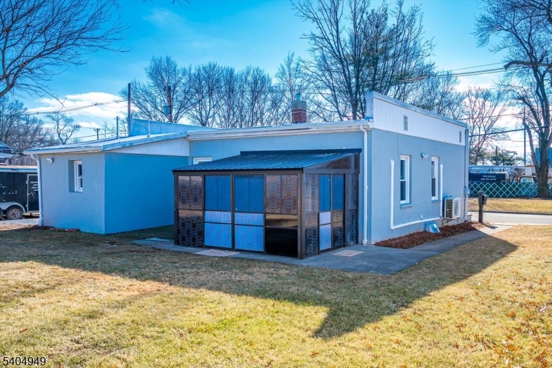 34 Tillman Street Raritan, NJ 08869 - Photo 26 of 31 a view of a house with a yard covered in snow