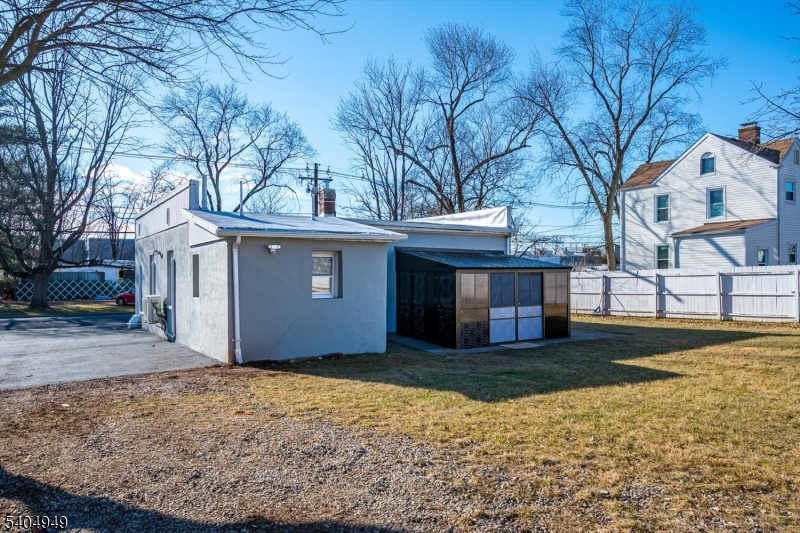 34 Tillman Street Raritan, NJ 08869 - Photo 27 of 31 a view of a house with a yard