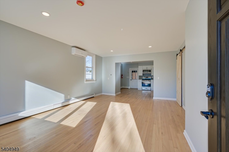 34 Tillman Street Raritan, NJ 08869 - Photo 5 of 31 a view of a big room with closet and windows