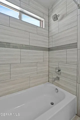 a bathroom with a bathtub