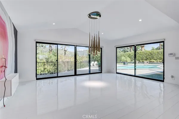 a view of room with a large window