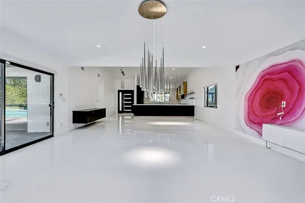 a view of kitchen with furniture and window