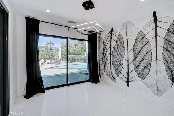 a view of a livingroom with a flat screen tv