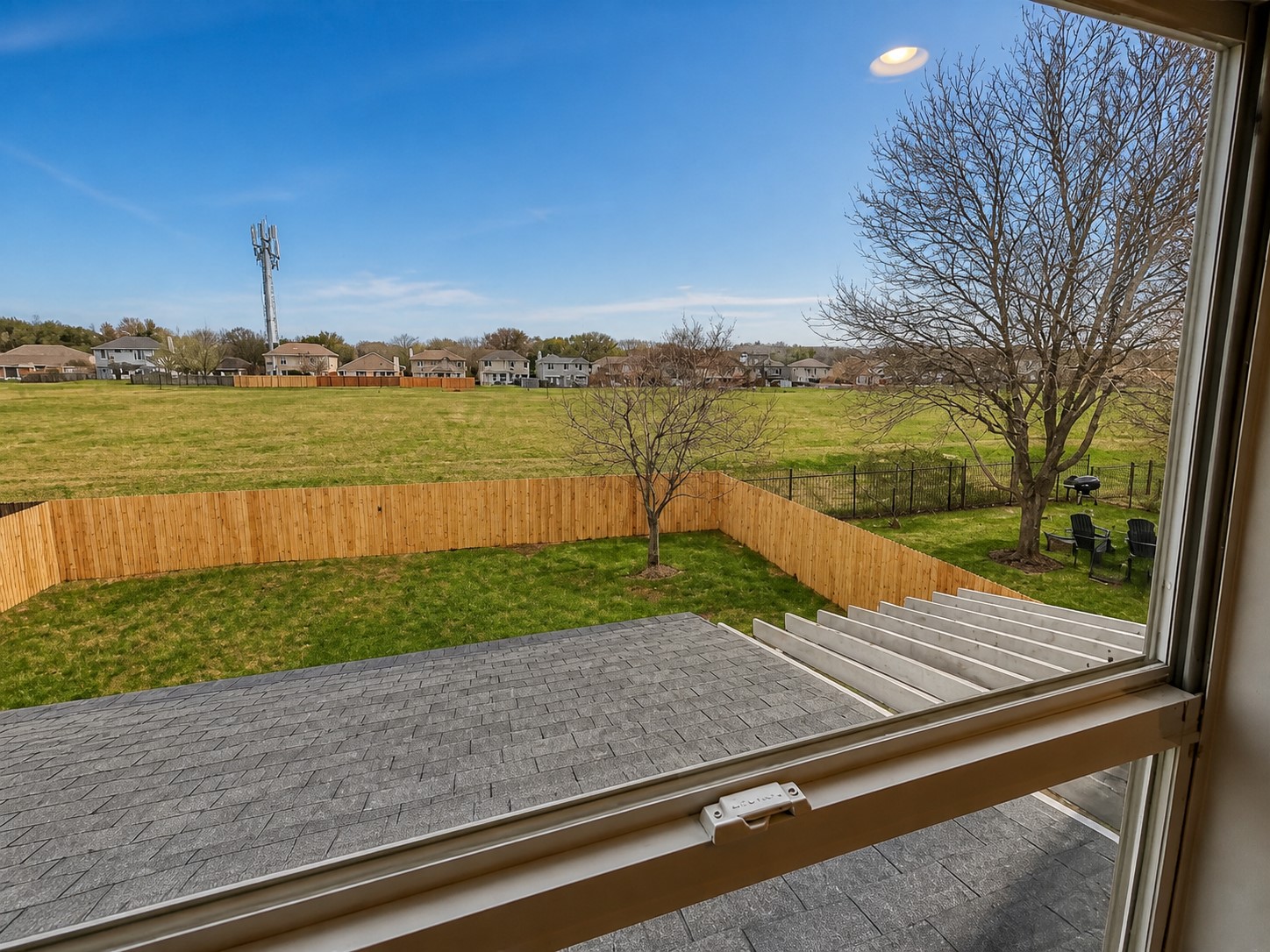 14828 Single Trace Austin, TX 78728 - Photo 14 of 30 Fenced backyard with established lawn and a large shade tree