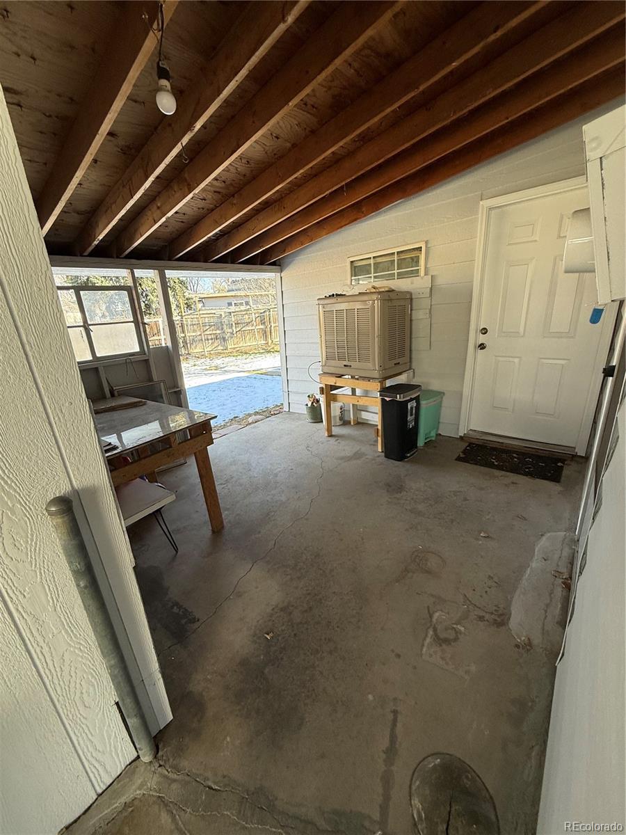 756 Vaughn Street Aurora, CO 80011 - Photo 22 of 22 a view of a room with gym equipment