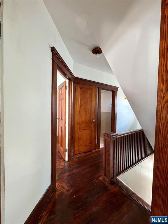 28 Arlington Avenue Paterson, NJ 07502 - Photo 17 of 25 an entryway with a staircase