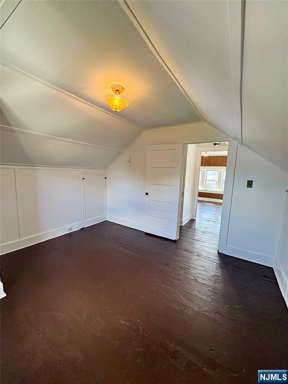 28 Arlington Avenue Paterson, NJ 07502 - Photo 23 of 25 a view of empty room with wooden floor