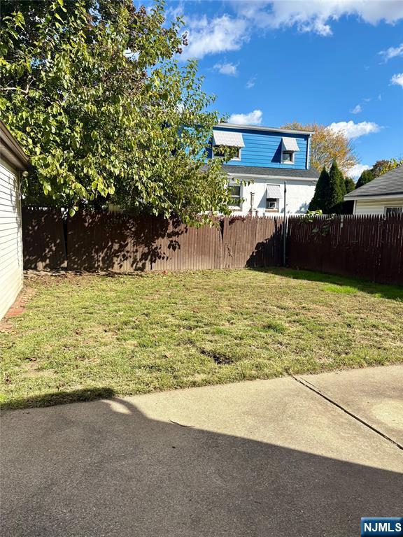28 Arlington Avenue Paterson, NJ 07502 - Photo 5 of 25 a view of a pool with a yard