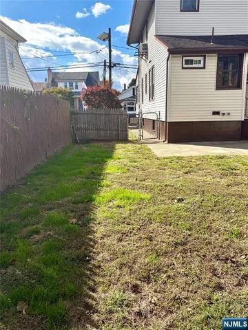 a kitchen with stainless steel appliances granite countertop a stove and a microwave