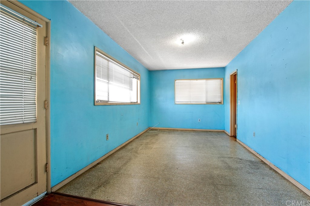 8849 Pico Vista Road Pico Rivera, CA 90660 - Photo 13 of 35 an empty room with windows