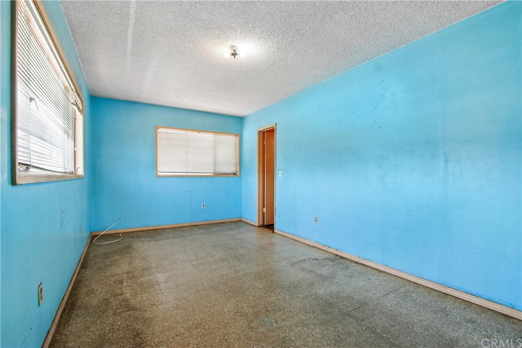8849 Pico Vista Road Pico Rivera, CA 90660 - Photo 14 of 35 an empty room with windows