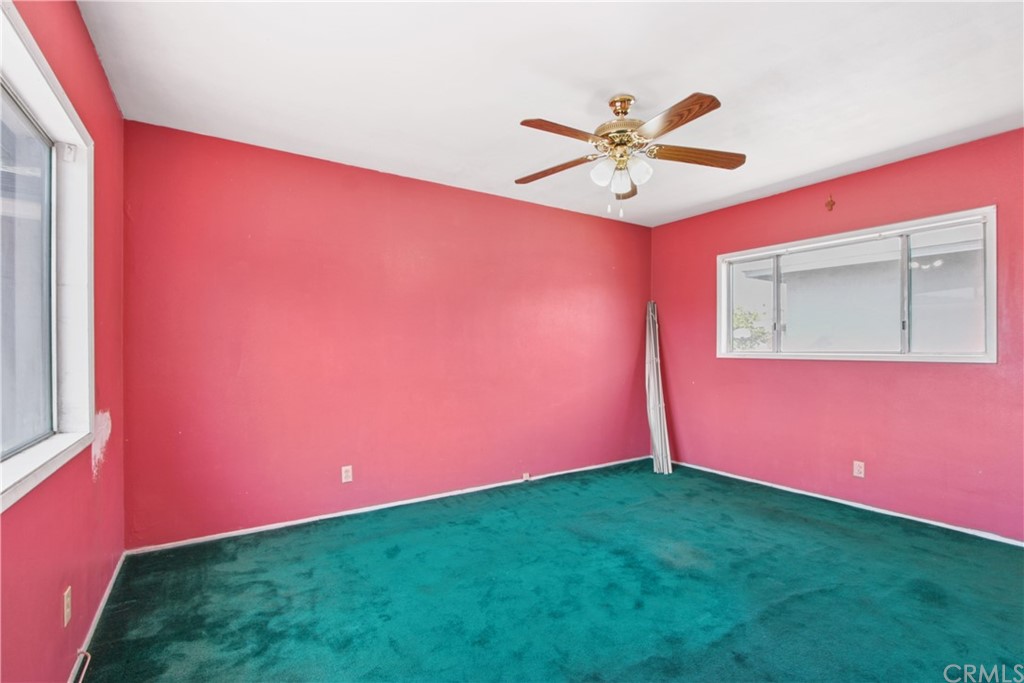 8849 Pico Vista Road Pico Rivera, CA 90660 - Photo 20 of 35 a view of a big room with a chandelier fan and wooden floor