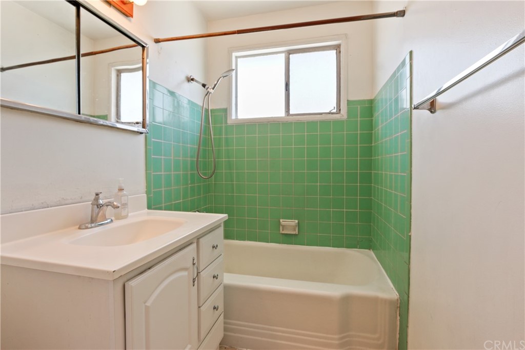 8849 Pico Vista Road Pico Rivera, CA 90660 - Photo 22 of 35 a bathroom with a sink and a bathtub