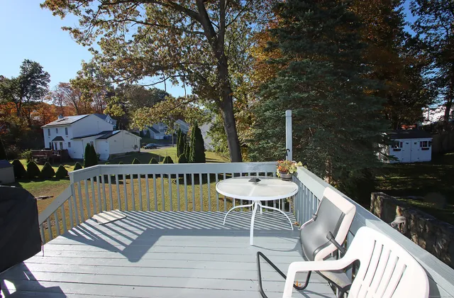a view of a chairs and table in the terrace