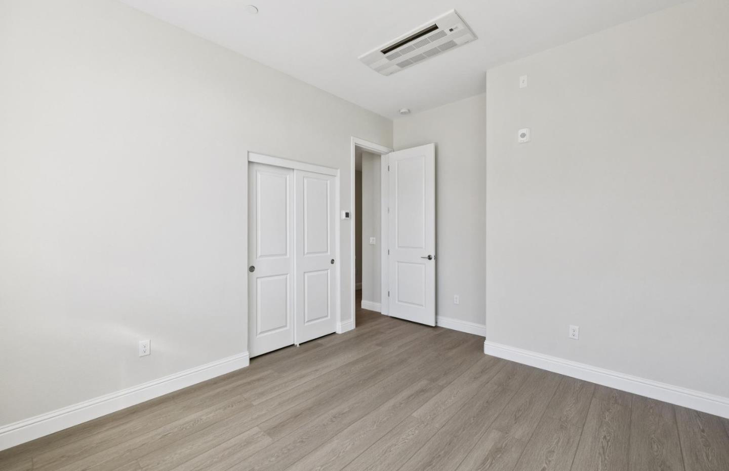2425 Willow Way San Mateo, CA 94403 - Photo 27 of 39 a view of an empty room with wooden floor