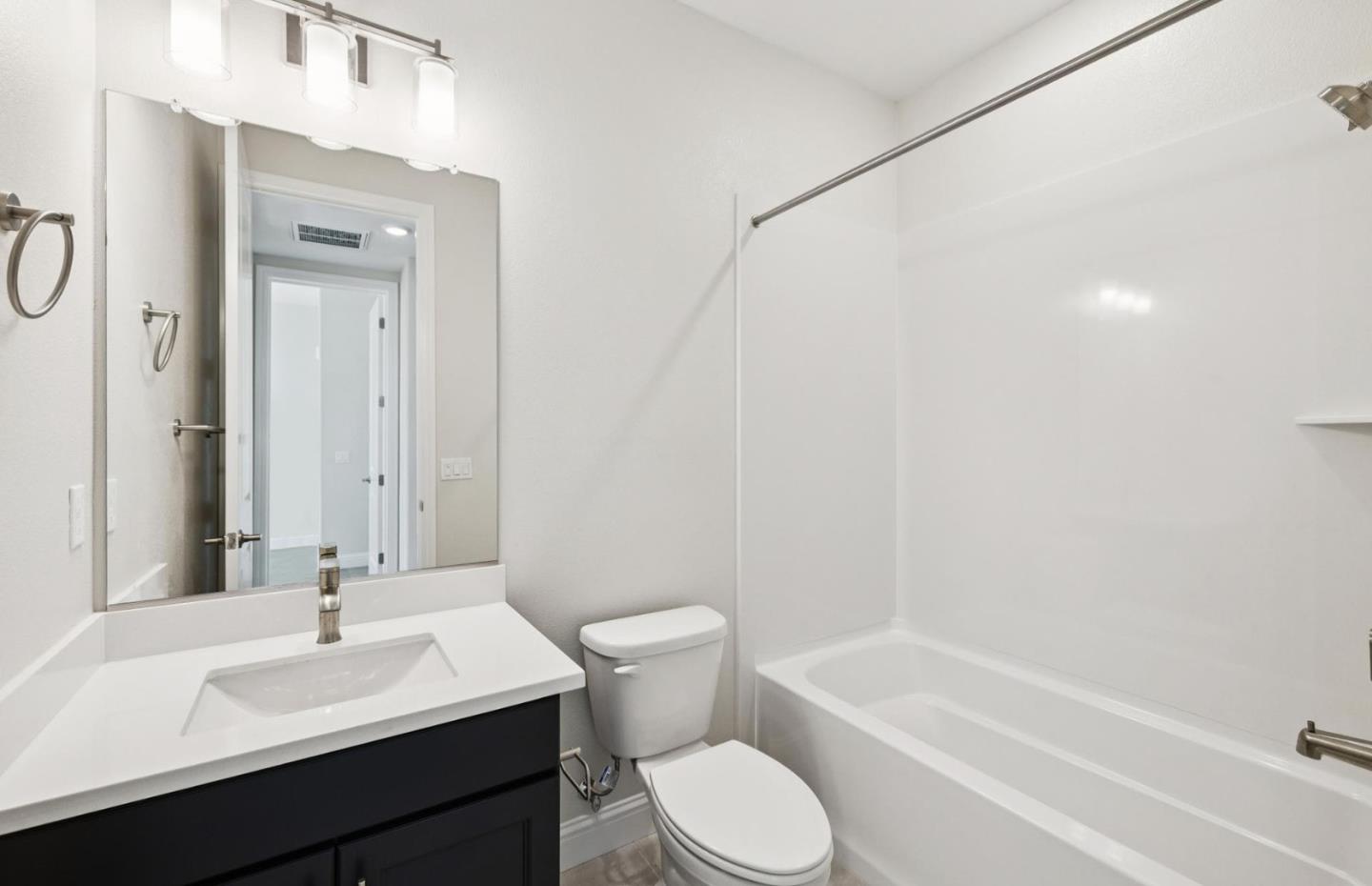 2425 Willow Way San Mateo, CA 94403 - Photo 28 of 39 a bathroom with a sink a toilet and shower