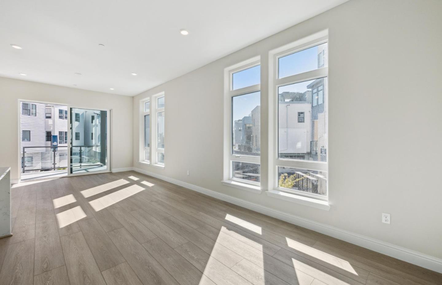 2425 Willow Way San Mateo, CA 94403 - Photo 36 of 39 a view of an empty room with wooden floor and a window