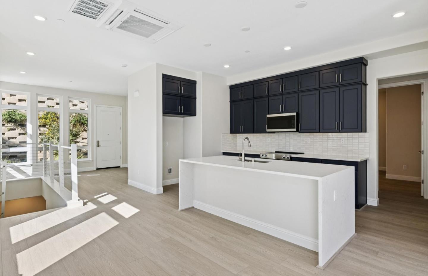 2425 Willow Way San Mateo, CA 94403 - Photo 39 of 39 a kitchen with stainless steel appliances a stove a sink and a refrigerator